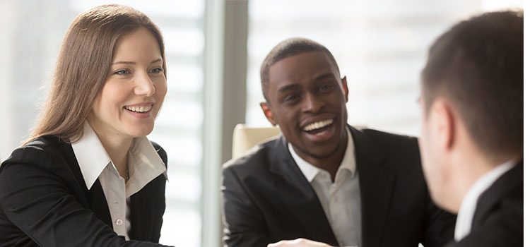 A man meets two other professionals for an interview